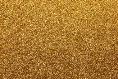 Altın rengin ışıltılı arkaplanı lüks zenginliği simgeleyen pamuk zenginliğini simgeliyor.