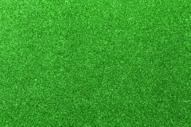 Yatay formatta parlayan parlak yeşil arkaplan doğa veya çayırlar için ideal bir zemin.