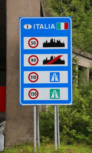 road sign on the border with Italy text with the indications of the speed limits in the city on the extra-urban roads and on the highway