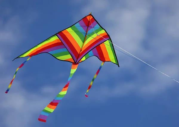 Colorful Triangular Kite Flying High Blue Sky Some White Clouds — Foto Stock