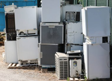 deposit of used household appliances in the landfill for the collection of polluting material