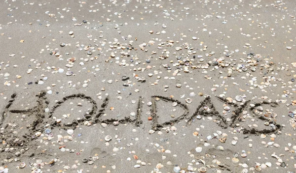 Large Text Word Holidays Capital Letters Sand Sandy Beach Trhe — Photo