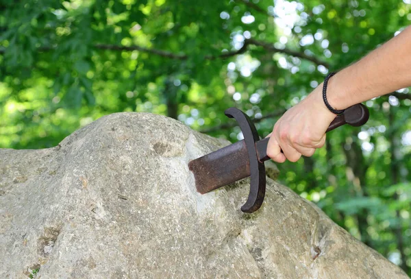 Hand Man Who Tends Perform Legendary Feat Extracting Sword Stuck — Fotografia de Stock