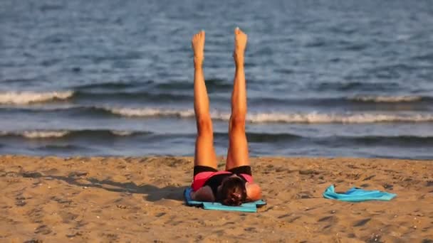 Athletic Girl Does Gymnastic Exercises Mat Beach — Stockvideo