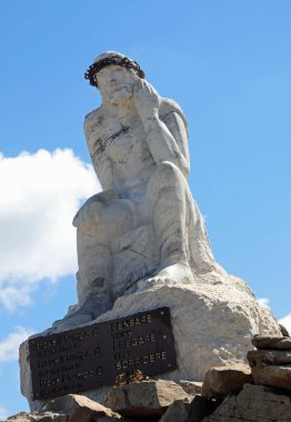 Passo Rolle, TN, Italy - August 1, 2022: Statue of CRISTO PENSANTE that means thinking christ in the italian Dolomites