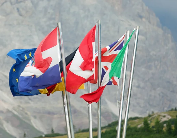 Many International Flags Nations Waving Intentional Blur Mountains — Stockfoto