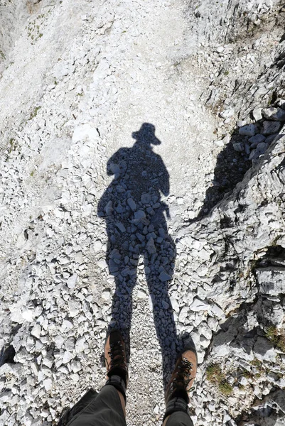 Shadow Hiker Hat His Boots Walk Stony Path Italian Dolomites — Stock fotografie