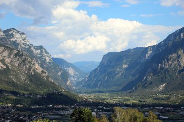 view of the wide valley leading up to Trento and the data mountains in northern Italy