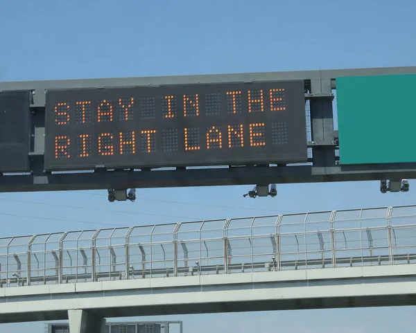 Big Highway Sign Warn Motorists Drive Rightmost Lane — Fotografia de Stock