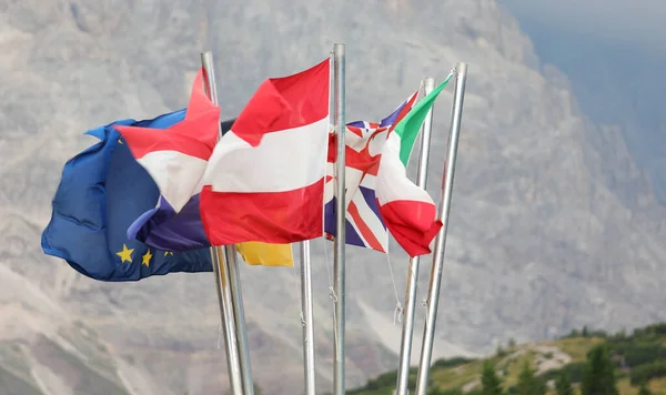 Many International Flags Nations Waving Intentional Mountains Background — Stockfoto