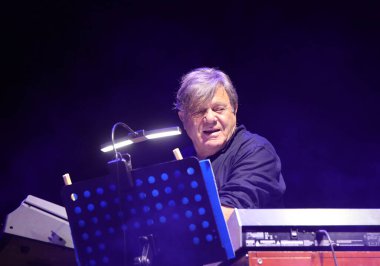 Vicenza, VI, Italy - September 4, 2022: Live Concert of an Italian band called NOMADI and BEPPE CARLETTI leader and piano player