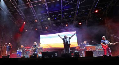 Vicenza, VI, Italy - September 4, 2022: Live Concert of an Italian band called NOMADI and Peace Flag on stage