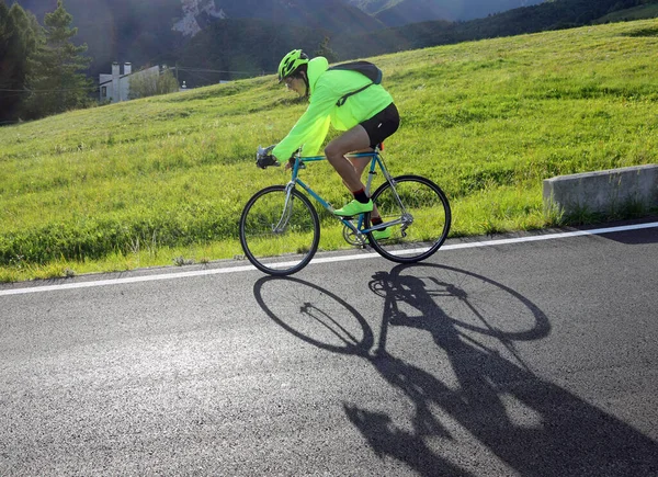 Young Cyclist Racing Bicycle Phosphorescent Waterproof Jacket Mountain Road — Stock Photo, Image