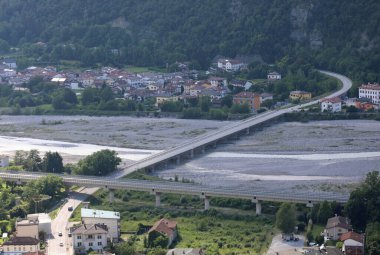 bridge over the river BUT of the city of TOLMEZZO in the province of Udine in the Friuli Venezia Giulia region in Italy