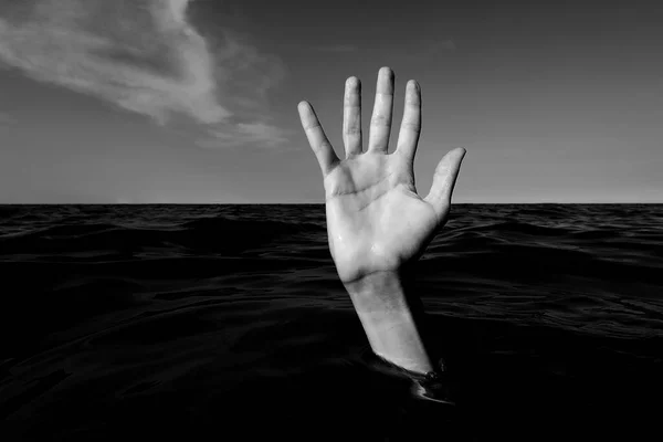 hand in water of sea  of a person who is drowning with balck and white effect