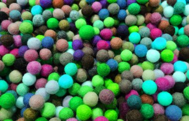 Oyulmuş keçeli yün toplarının arka planı