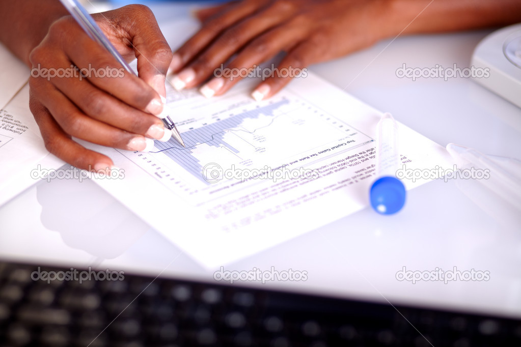 Scientific woman studying medical documents