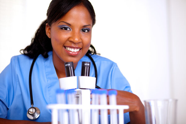 Afro-american nurse woman looking at you