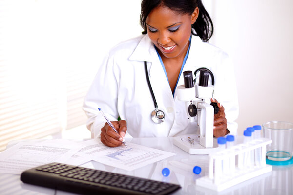 Medical doctor young female working at laboratory