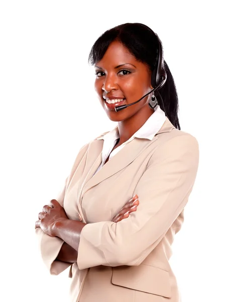 Smiling young woman wearing a headset — Stock Photo, Image