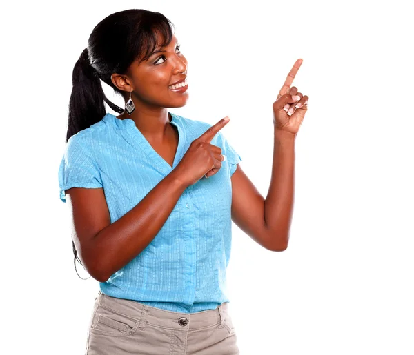 Smiling afro-american woman pointing up — Stock Photo, Image