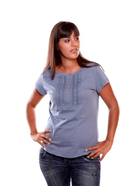 Attractive young woman on blue shirt looking left — Stock Photo, Image