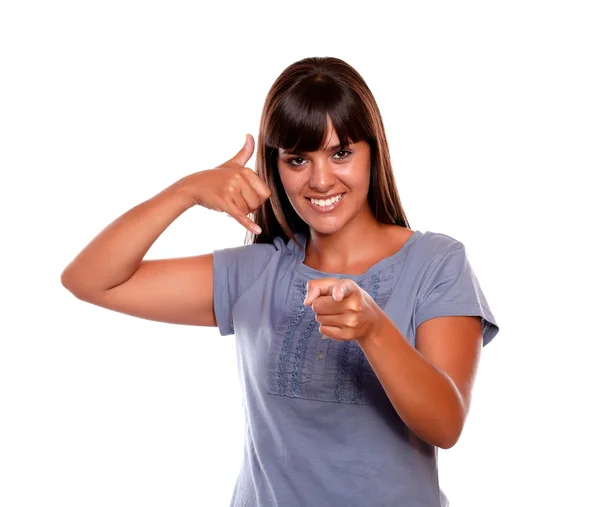 Pretty young woman pointing at you saying call me — Stock Photo, Image