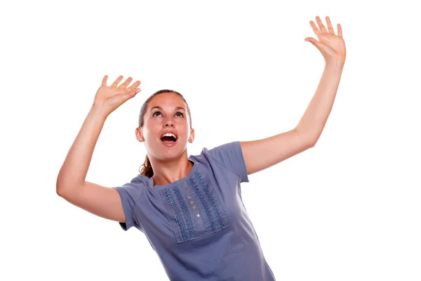 Excited young woman screaming with hands up — Stock Photo, Image