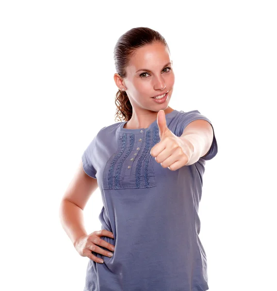 Positive young woman lifting the fingers up — Stock Photo, Image