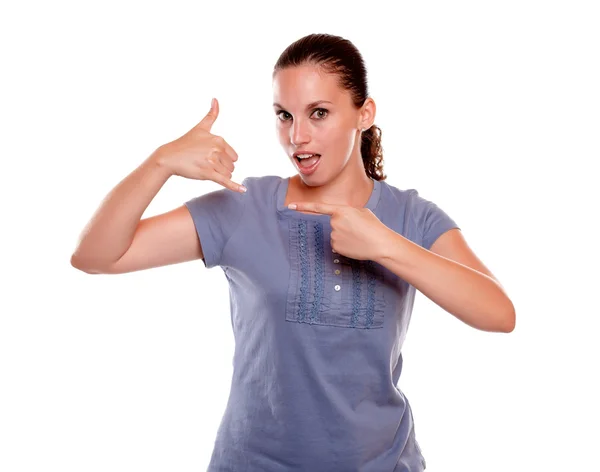 Stylish young woman looking at you saying call me — Stock Photo, Image