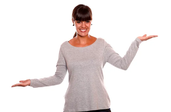 Smiling young female with the palms upward — Stock Photo, Image