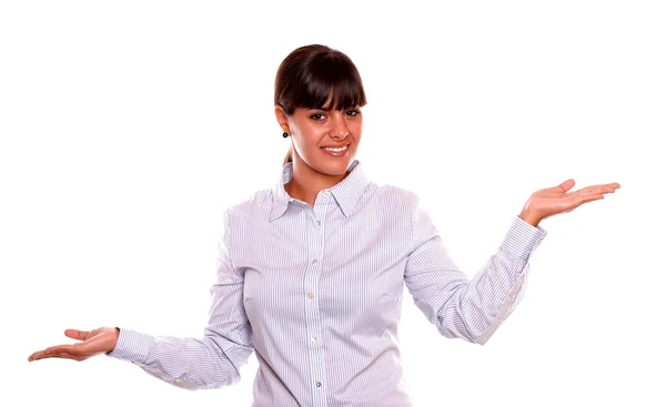 Smiling young woman holding out her palms — Stock Photo, Image
