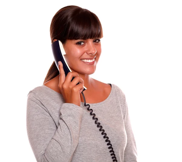 Beautiful young female speaking on phone — Stock Photo, Image