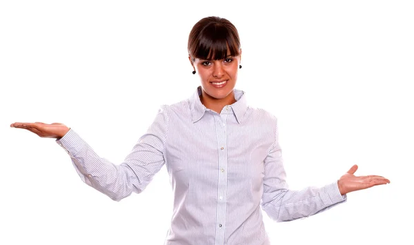 Smiling young female holding out her palms — Stock Photo, Image