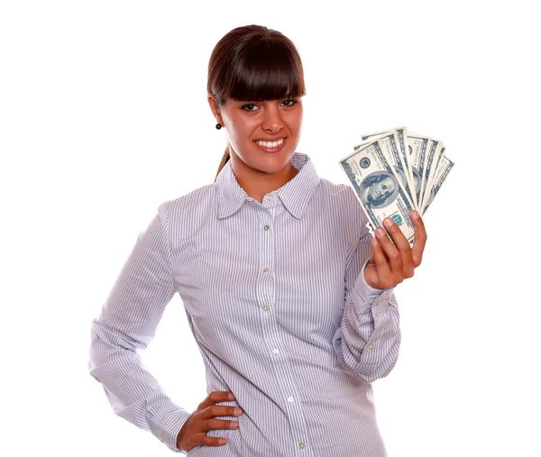 Smiling pretty young woman holding dollars — Stock Photo, Image