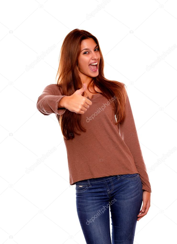 Charming female smiling and showing you ok sign