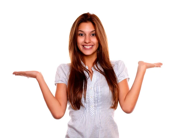 Smiling woman holding out her palms looking at you — Stok fotoğraf