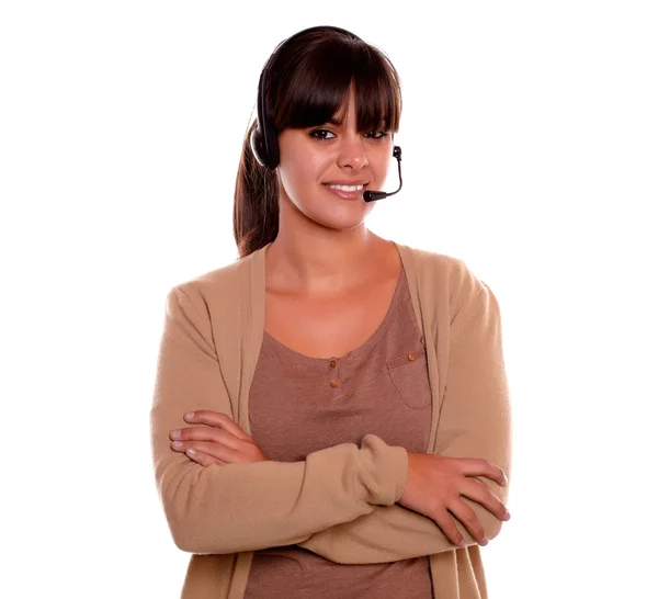 Charming young female using headphones looking you — Stock Photo, Image