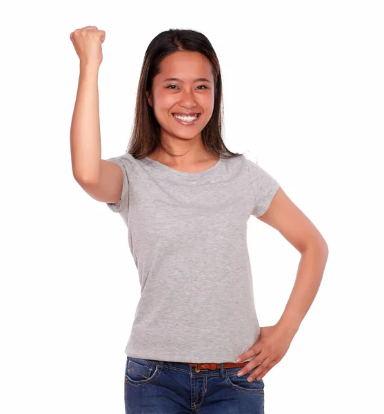 Smiling asiatic young woman celebrating a victory — Stock Photo, Image