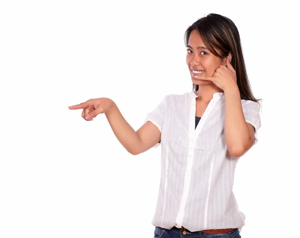 Charming young woman looking at you saying call me — Stock Photo, Image