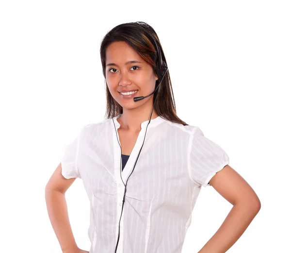 Smiling asiatic young woman using headphones — Stock Photo, Image
