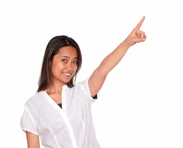 Charming asiatic young woman pointing to left up — Stock Photo, Image