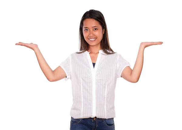 Young asiatic woman holding out her palms — Stock Photo, Image