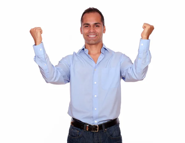 Emocionado hombre hispano celebrando una victoria — Foto de Stock