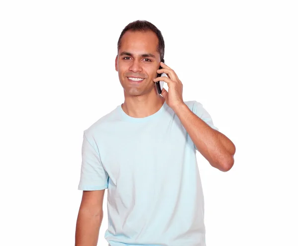 Smiling latin adult man speaking on cellphone — Stock Photo, Image