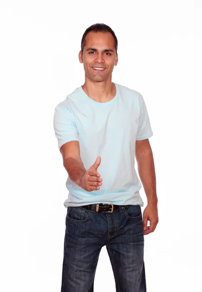 Smiling man extending handshake at you — Stock Photo, Image