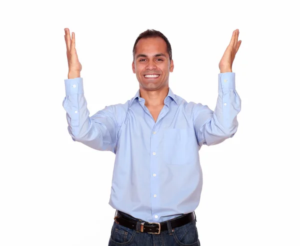 Excited latin man celebrating a victory — Stock Photo, Image