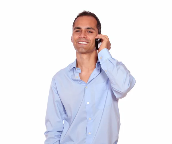 Smiling adult man speaking on cellphone — Stock Photo, Image