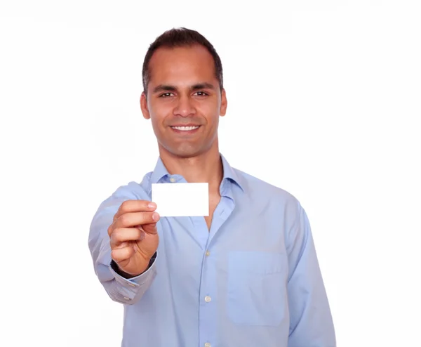 Attractive latin man holding a white card — Stock Photo, Image