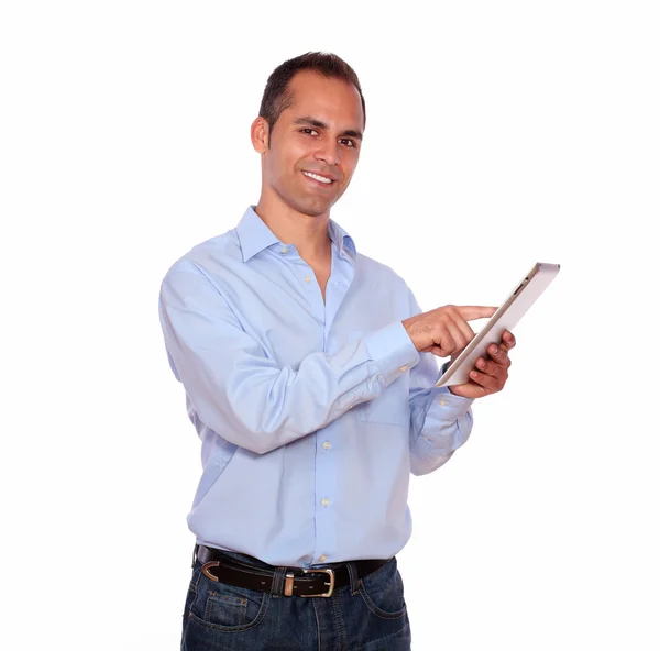 Hispanic adult man working on tablet pc — Stock Photo, Image
